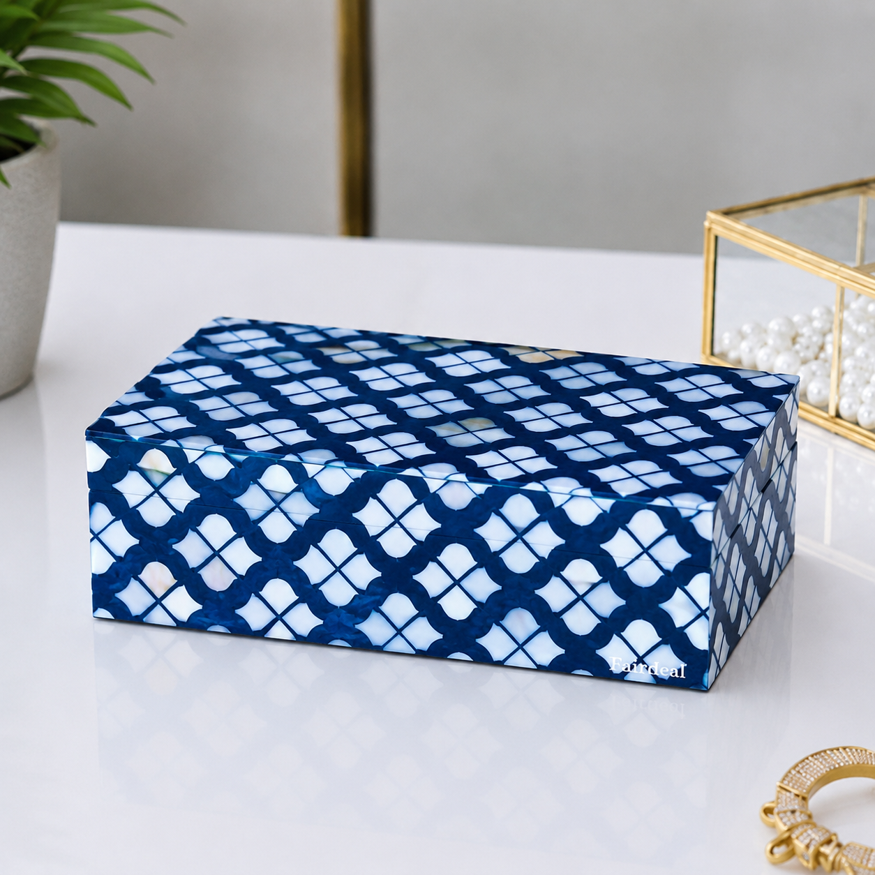 Artisan-made mother of pearl inlay trinket box in navy blue