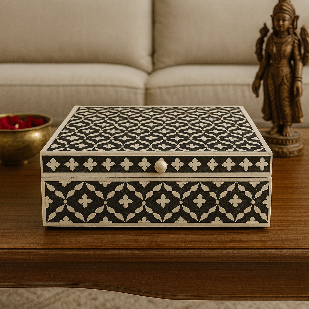 Handmade black Moroccan bone inlay jewelry box styled on a modern marble coffee table