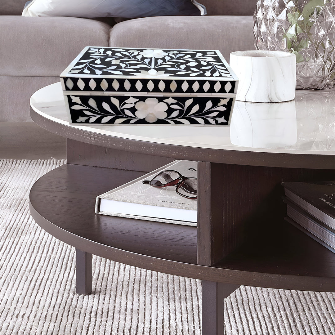Luxury bone inlay floral jewelry box with open lid showcasing jewelry storage in a contemporary home setting.