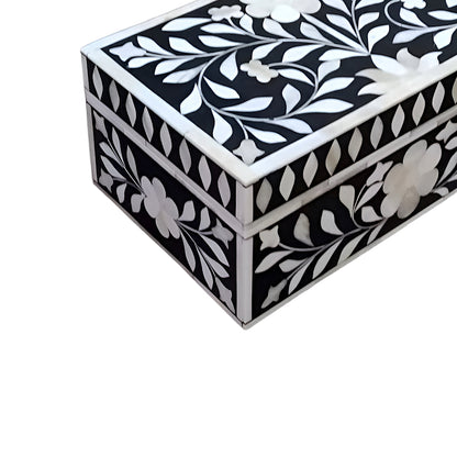 Custom black bone inlay jewelry box with intricate floral pattern and spacious interior for jewelry organization.