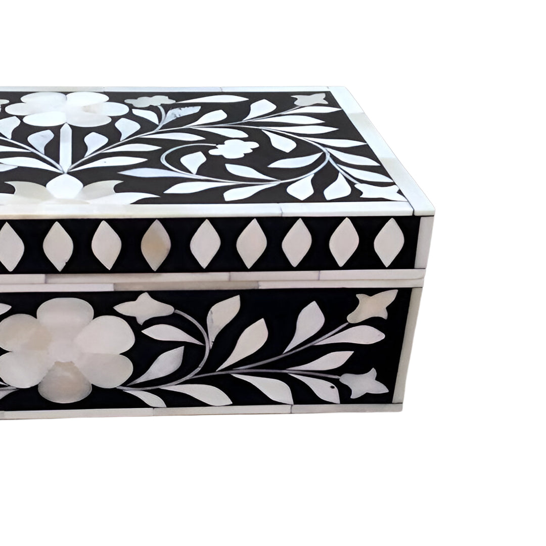 Elegant black bone inlay storage box with open lid featuring handcrafted floral detailing and jewelry display.