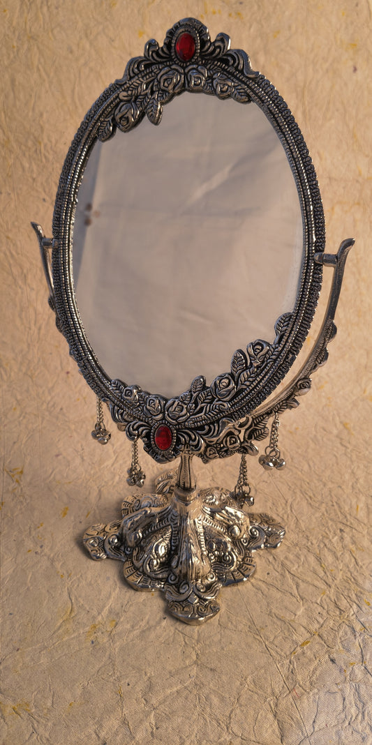 Elegant German Silver Oval Vanity Mirror with Floral Frame and Red Gem Accents