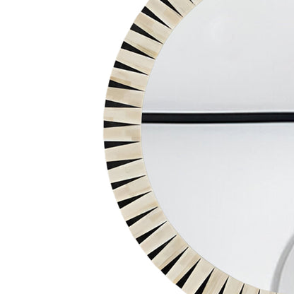 Modern living room styled with a handmade round bone inlay decorative wall mirror.