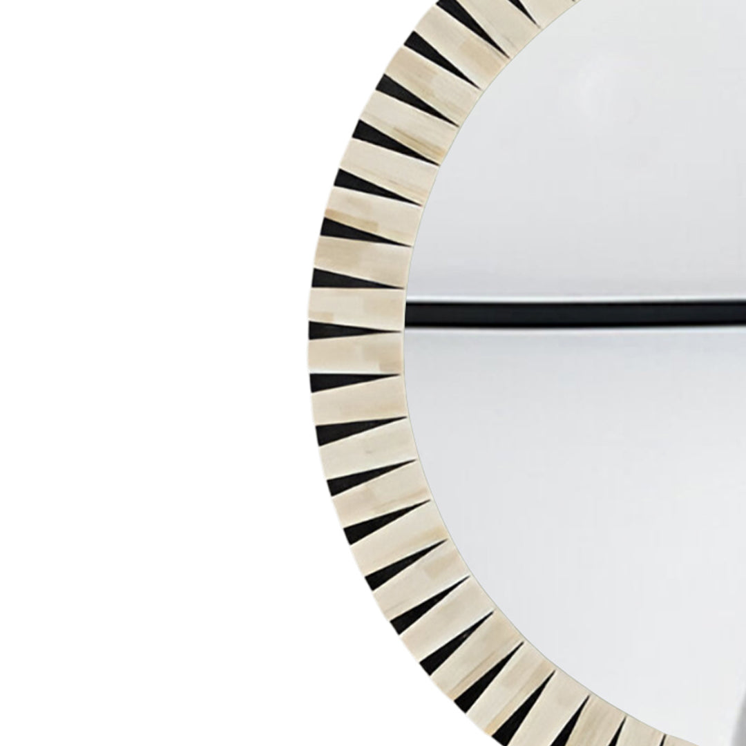 Modern home interior featuring a handcrafted round bone inlay statement mirror.