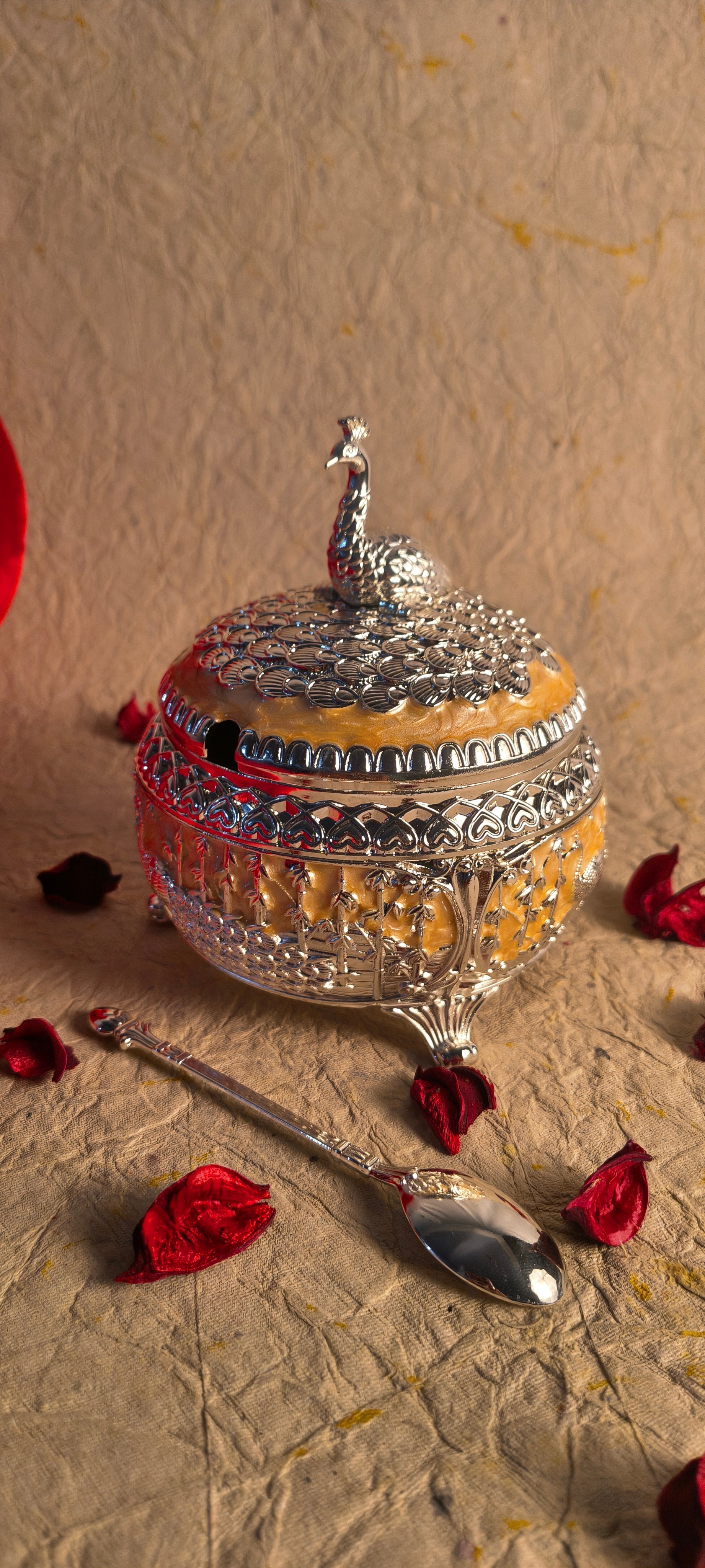 Handcrafted Peacock Storage Box with Ornate Floral Detailing and Decorative Lid