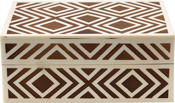 Luxury ivory and brown bone inlay jewelry box for storing jewelry, keepsakes, and valuables.