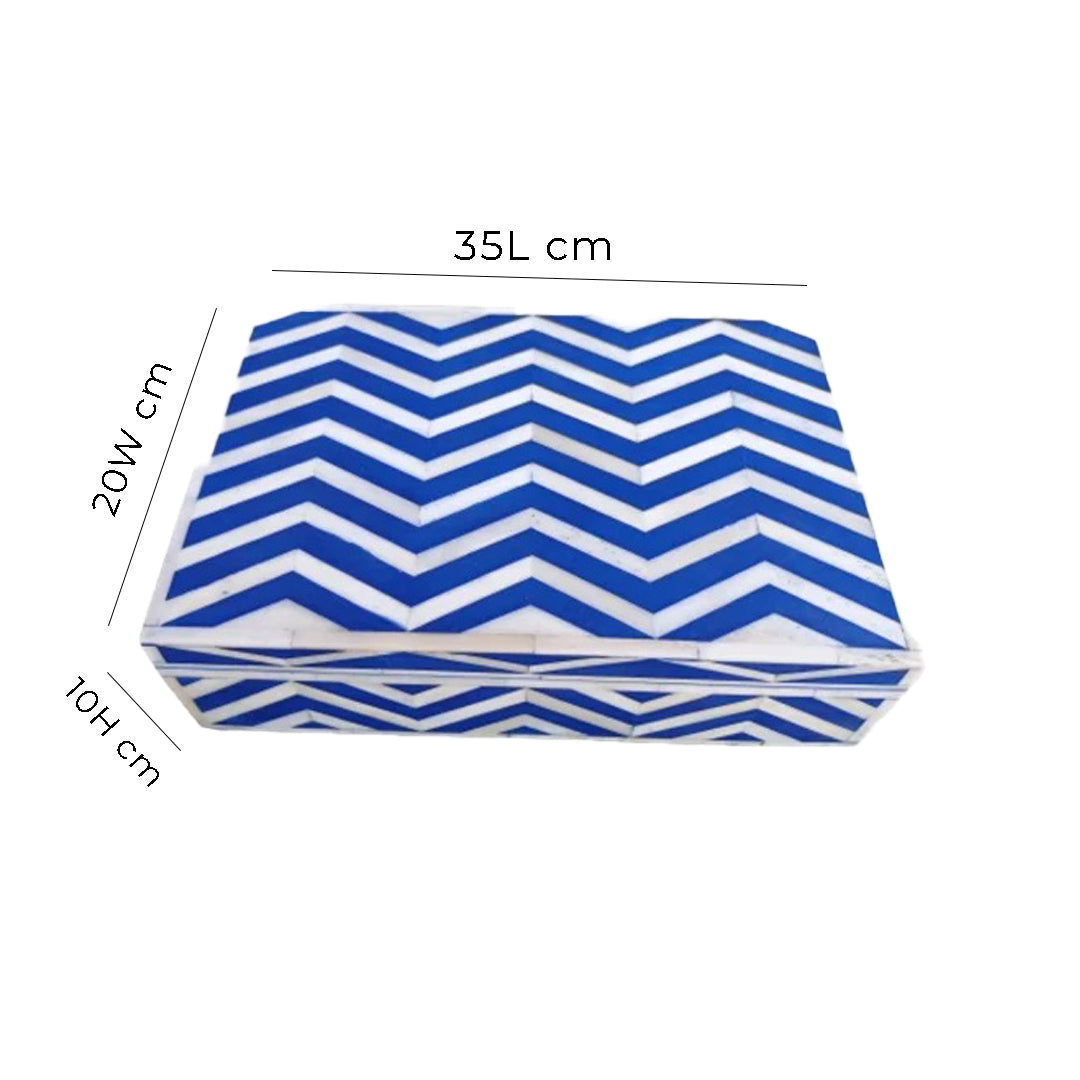 Customized bone inlay keepsake box with blue chevron pattern on a modern dresser