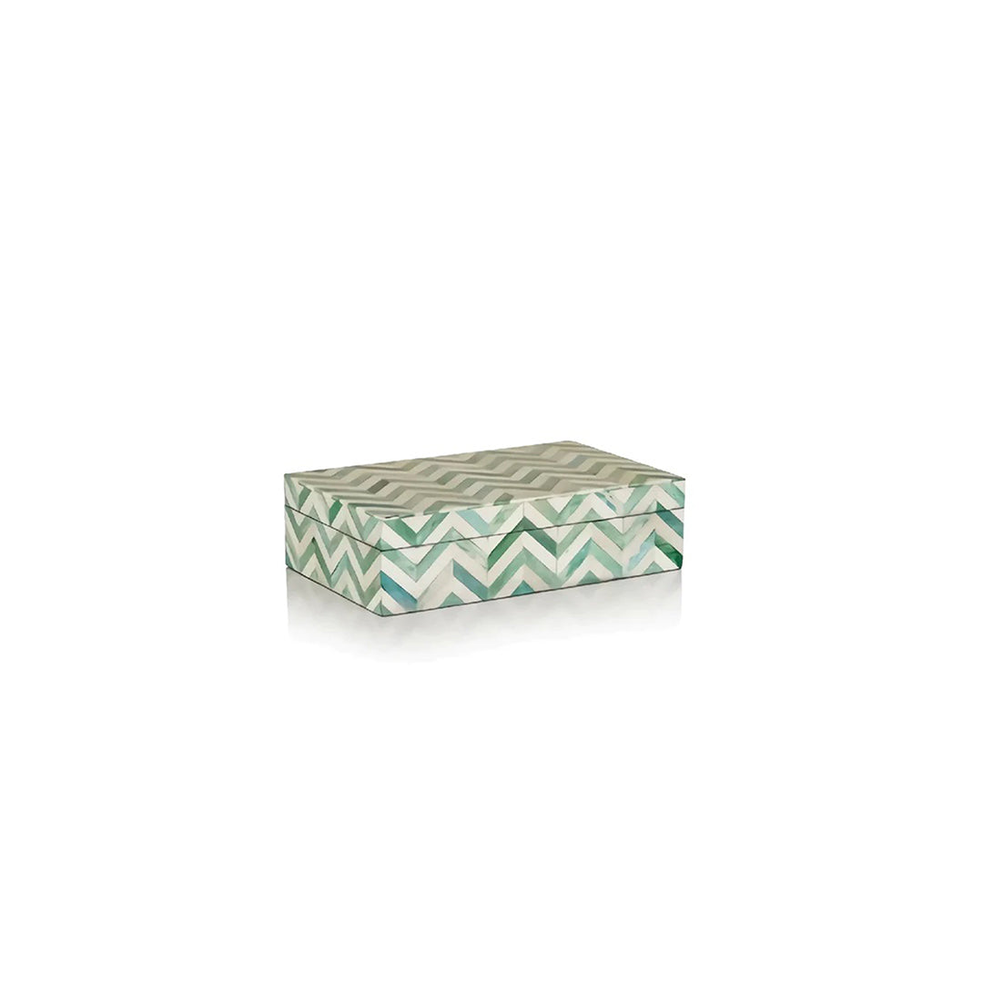 Handmade green chevron bone inlay box on modern marble kitchen countertop