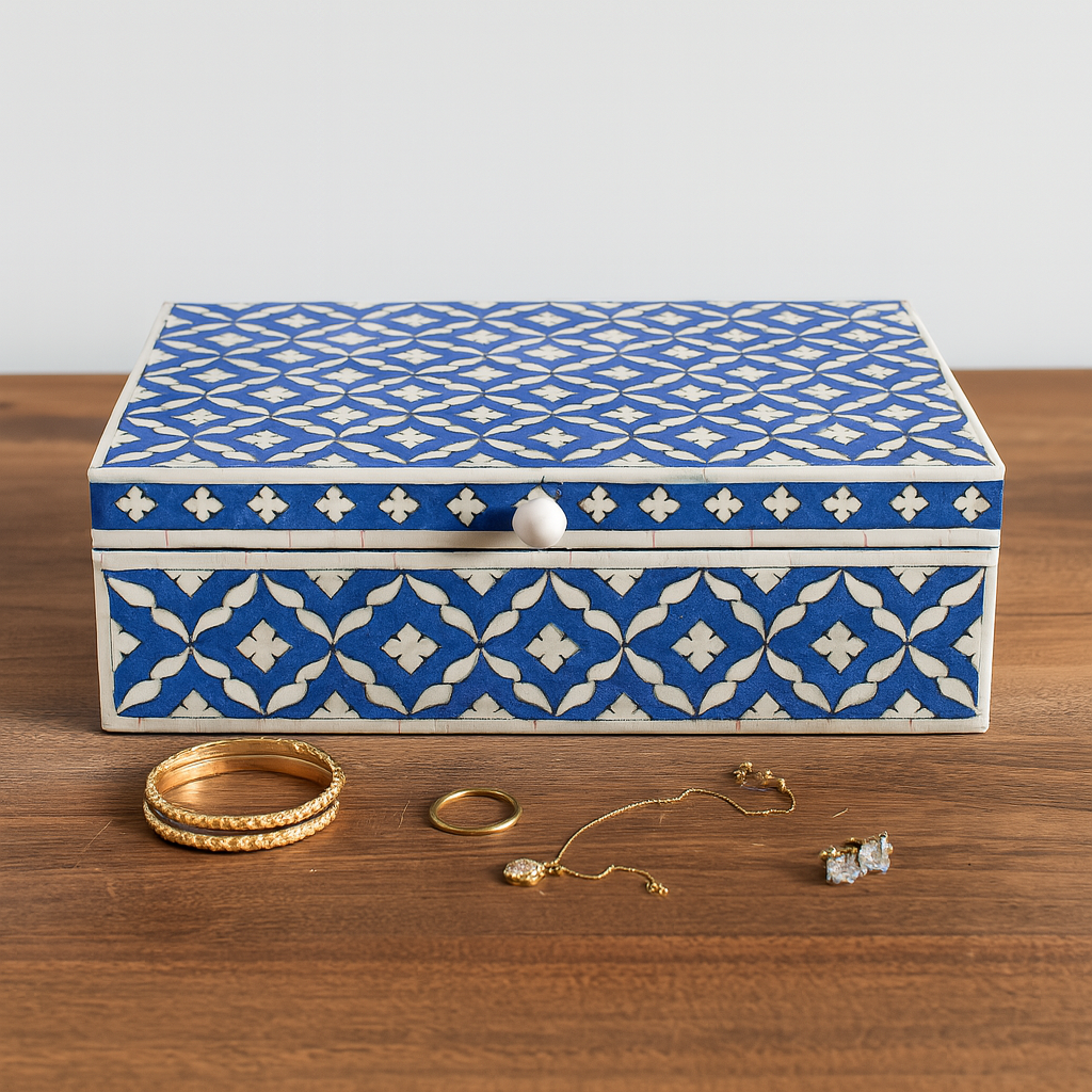 Handmade blue Moroccan bone inlay jewelry box styled on a modern marble vanity table