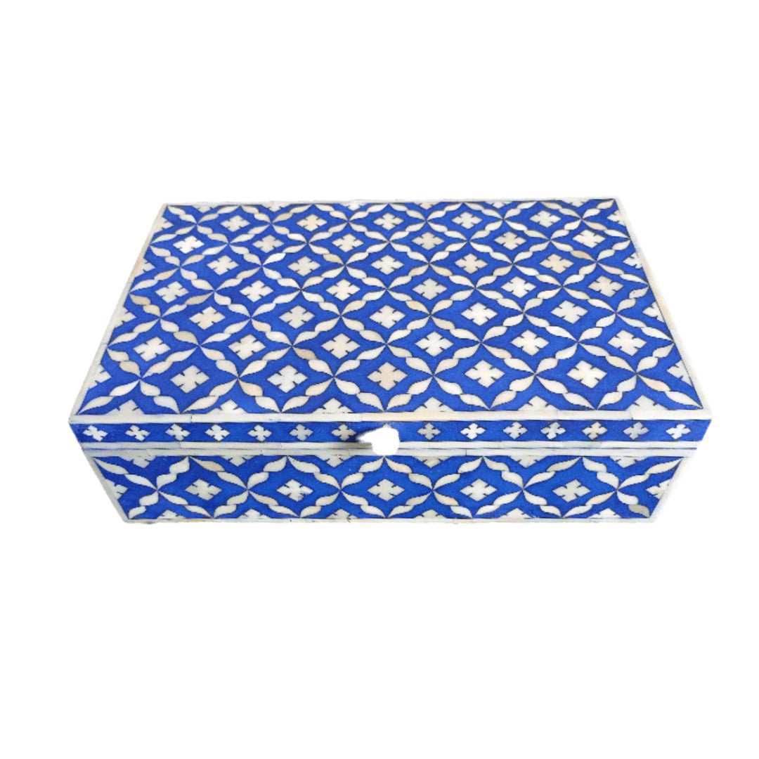 Custom bone inlay keepsake box with Moroccan design displayed on a modern console table