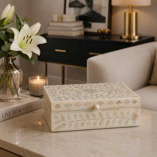 Handmade white floral bone inlay decorative box on a modern marble coffee table