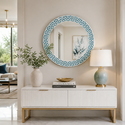 Handmade round bone inlay mirror frame with blue and white geometric pattern.