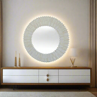 Luxury white bone inlay round wall mirror displayed in a modern living room