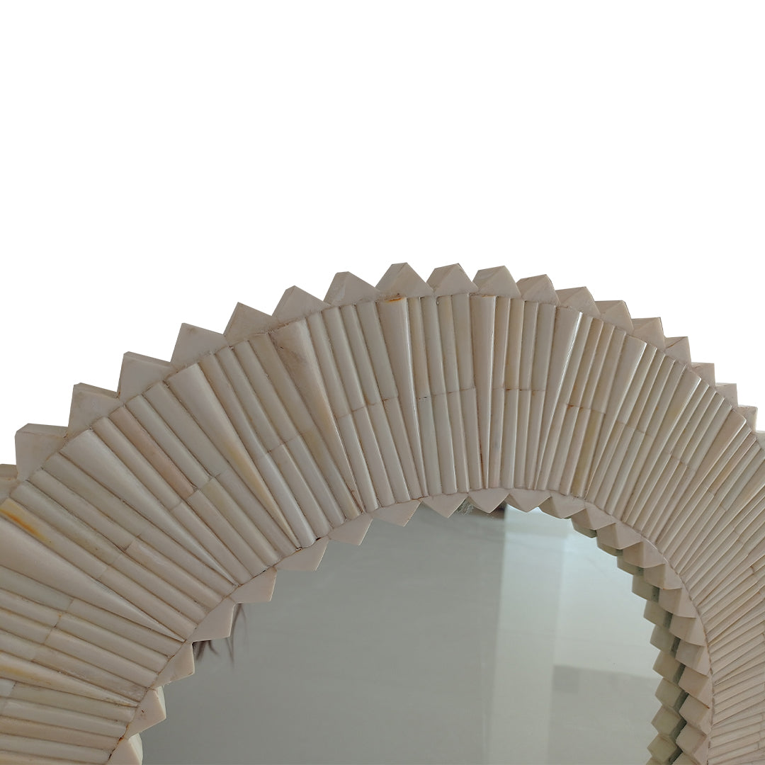Modern bone inlay round mirror frame styled above a luxury console table