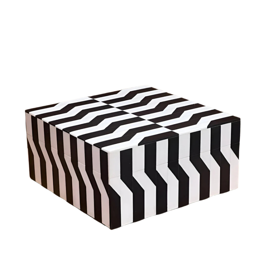 Black geometric bone inlay box styled in modern bedroom décor