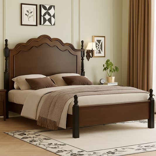 Solid wood bed with scalloped headboard and black turned posts in mahogany finish, styled in a modern luxury bedroom with neutral decor.


