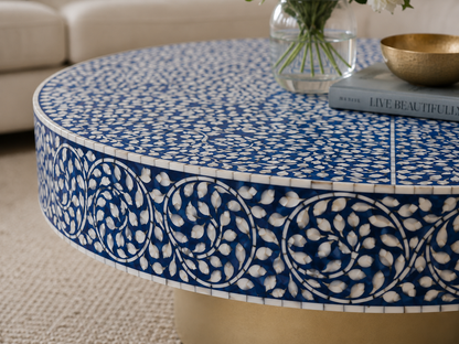 Blue bone inlay round center table with white floral inlay design in luxury living room