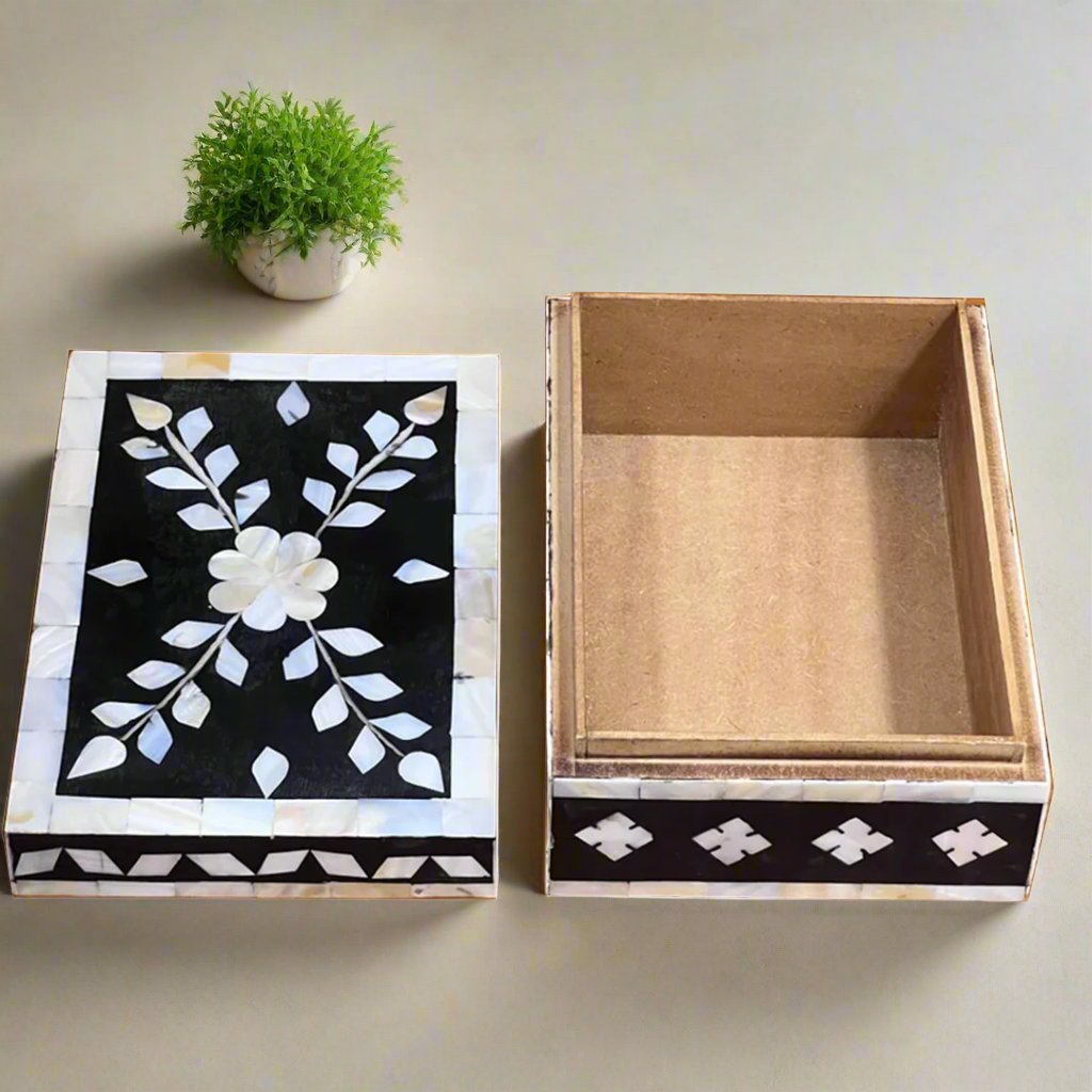 Handmade rectangular jewelry box featuring floral vine inlay design.