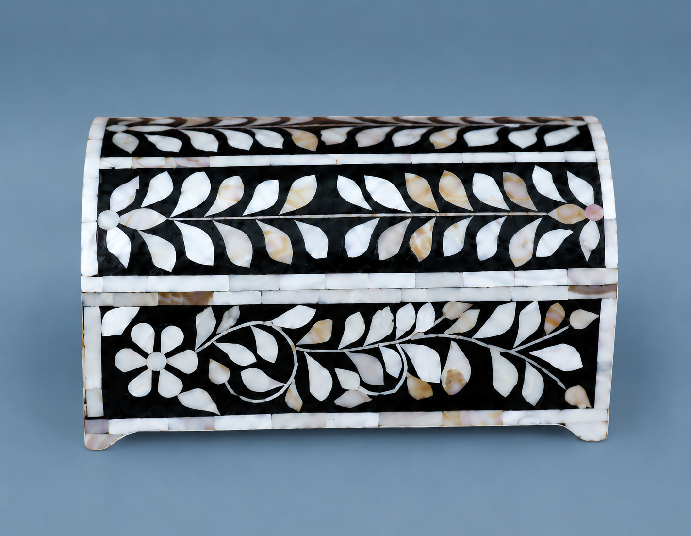 Handmade Mother of Pearl jewelry box with black floral inlay pattern and luxury accessories