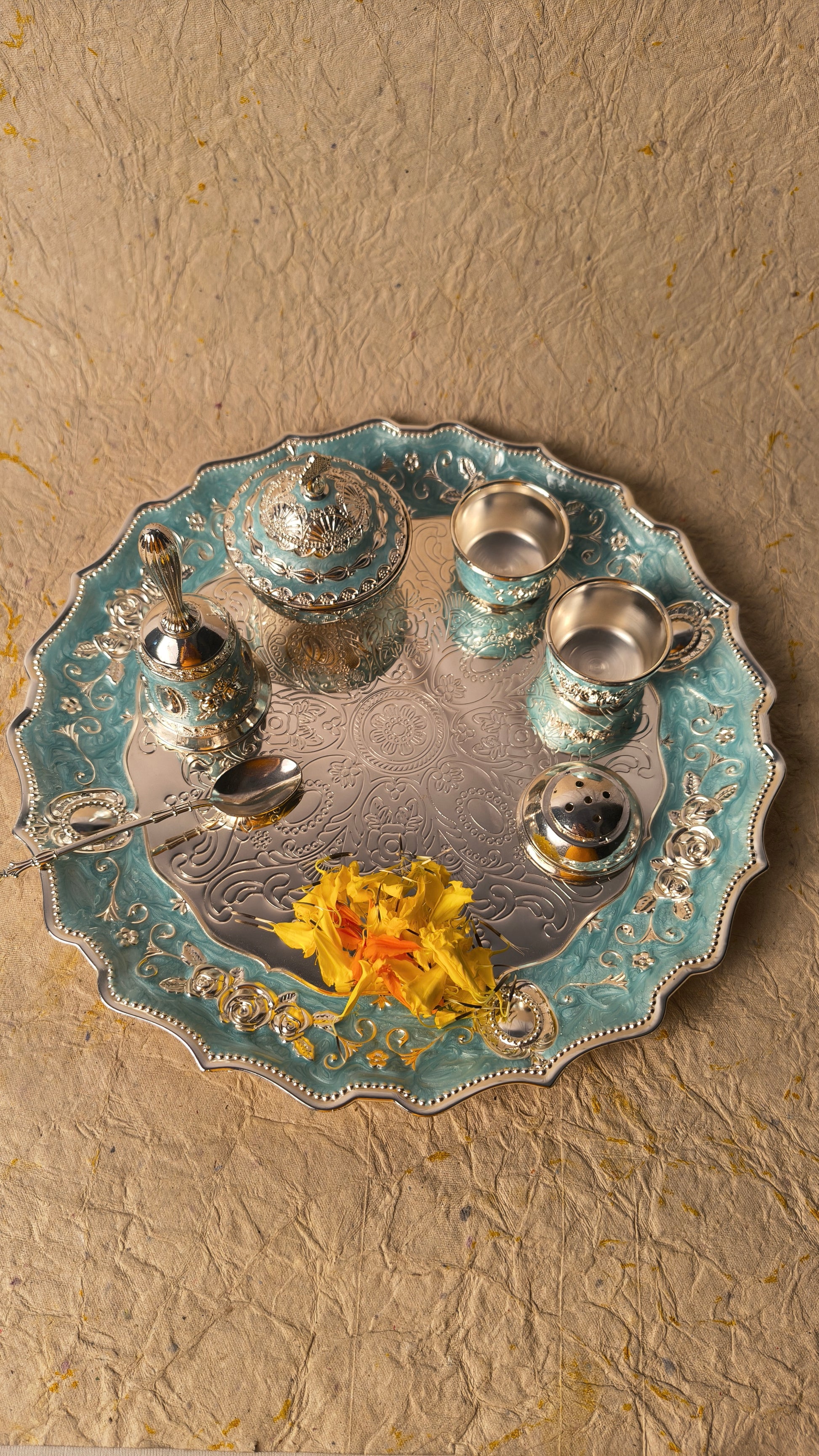 Elegant Floral Pooja Thali Set with Blue Enamel Finish and Traditional Puja Accessories.