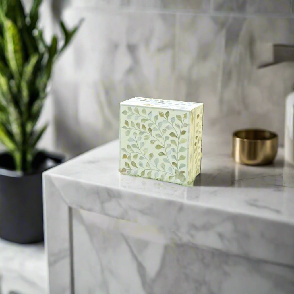 Angled View of Handmade White Mother of Pearl Inlay Jewelry Box with Floral Vine Pattern