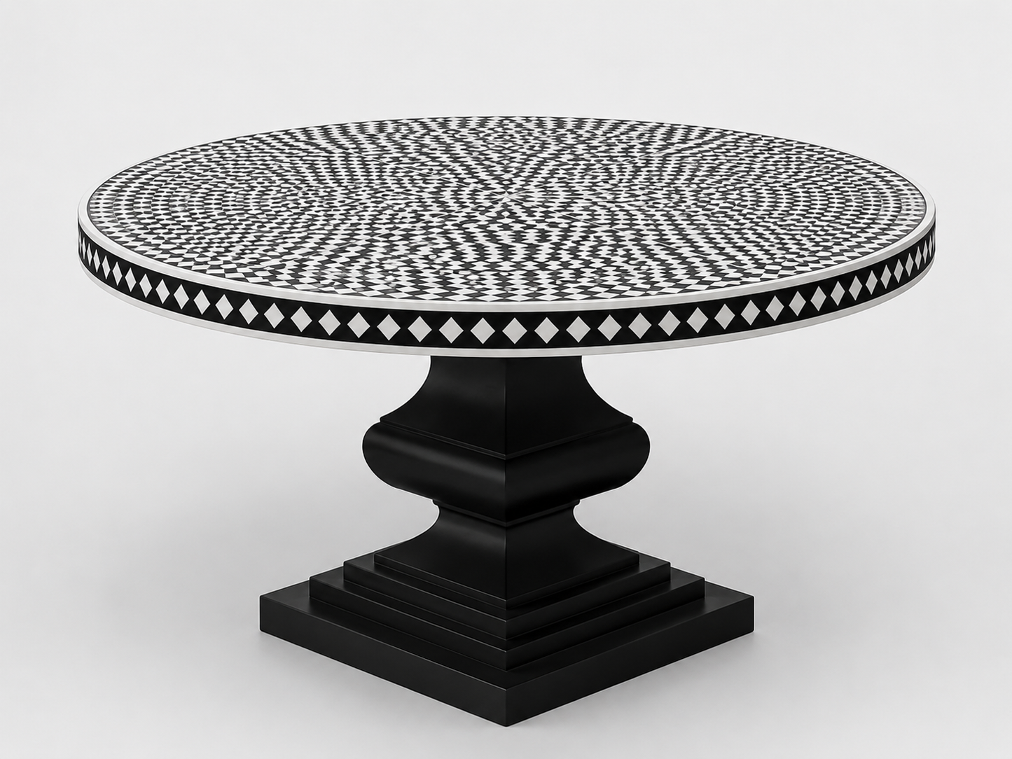 Modern black bone inlay dining table with geometric mosaic top and statement pedestal base.