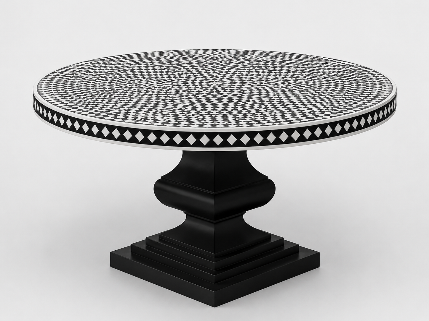 Modern black bone inlay dining table with geometric mosaic top and statement pedestal base.