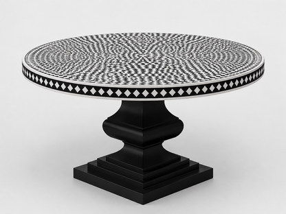 Modern black bone inlay dining table with geometric mosaic top and statement pedestal base.