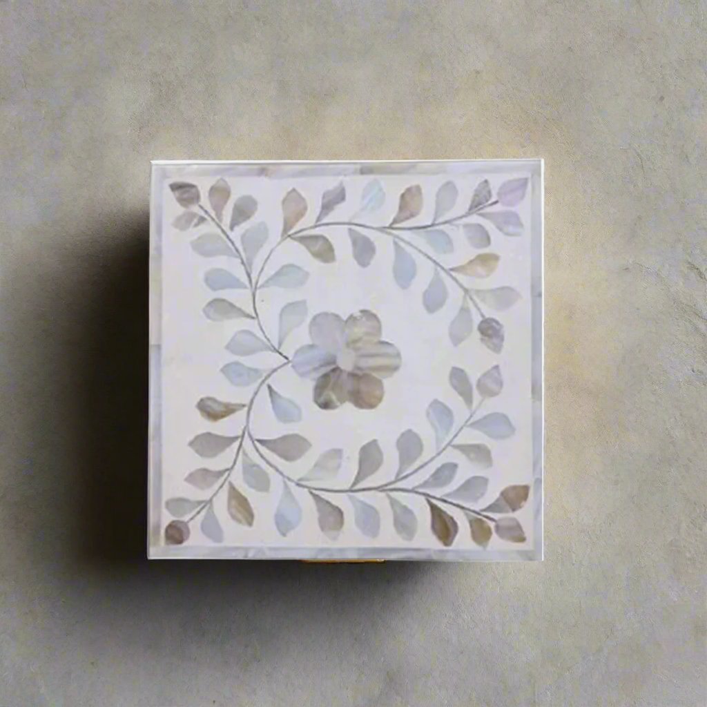 Handcrafted white mother of pearl inlay jewelry box with floral vine pattern and removable lid.