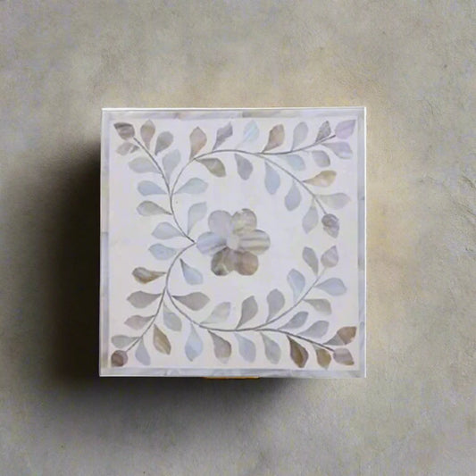 Handcrafted white mother of pearl inlay jewelry box with floral vine pattern and removable lid.