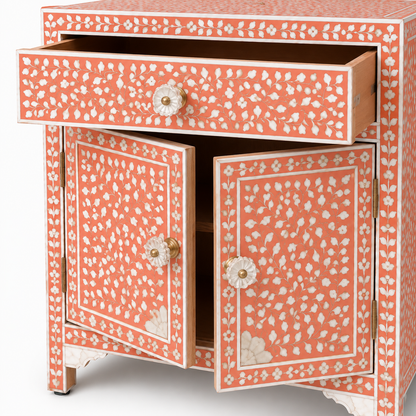 Close-Up of Floral Vine Bone Inlay Craftsmanship on Peach Cabinet