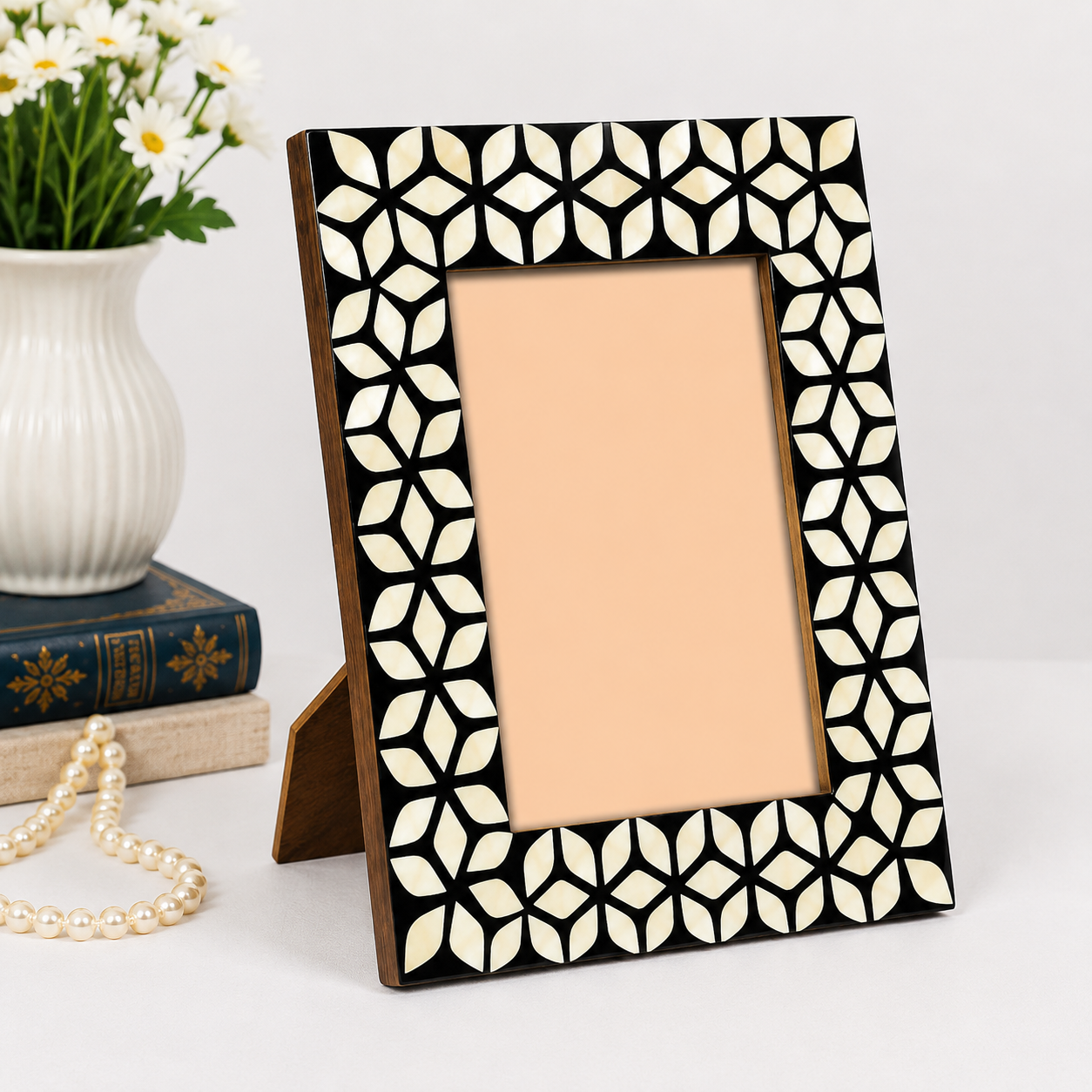 Detailed Mother of Pearl Inlay Craftsmanship on Black Picture Frame