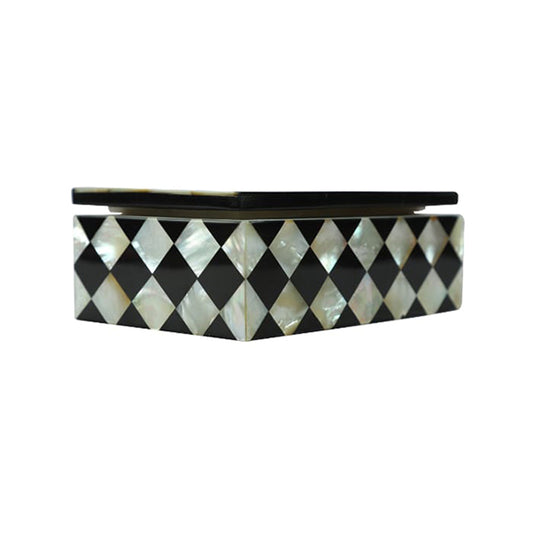 Luxury Mother of Pearl jewelry box featuring a black and white geometric inlay design with gold and pearl accessories.