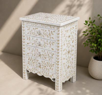 White mother of pearl chest of drawers with intricate floral design