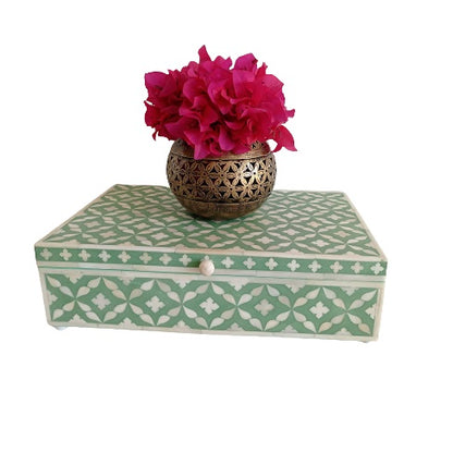 Handcrafted teal bone inlay jewelry box featuring a Moroccan pattern in a contemporary home décor setting.