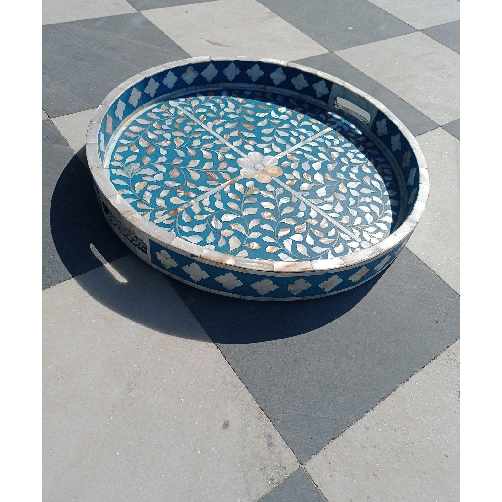Round serving tray with handcrafted mother of pearl floral pattern